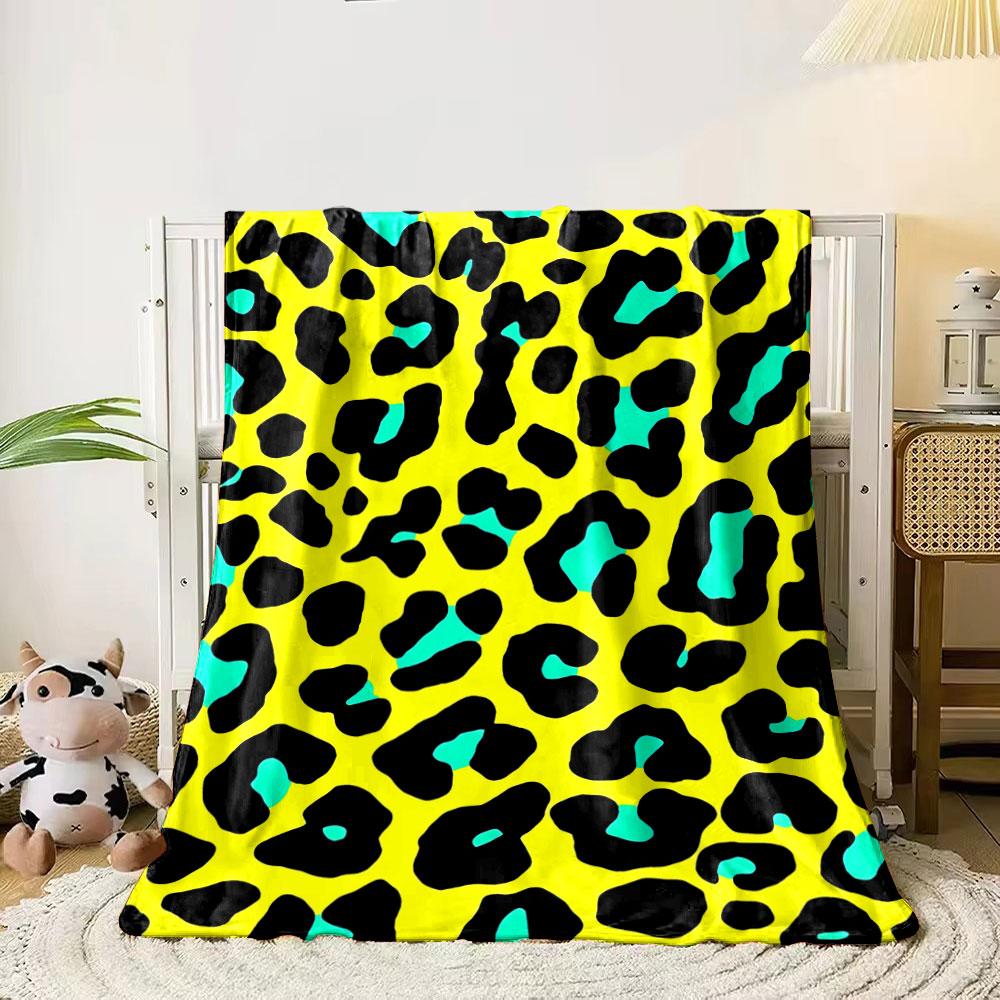 

Black leopard spots with turquoise accents on a bright yellow background. for all seasons blanket lunch break throw gift 80cm x 120cm