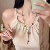 Retro ethnic style camellia handmade braided rope necklace antique high-end design collarbone chain niche personalized item decoration
