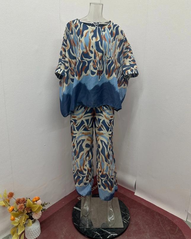 

Женский домашний комплект с абстрактным принтом, состоящий из топа свободного кроя и брюк широкого кроя. XS синий