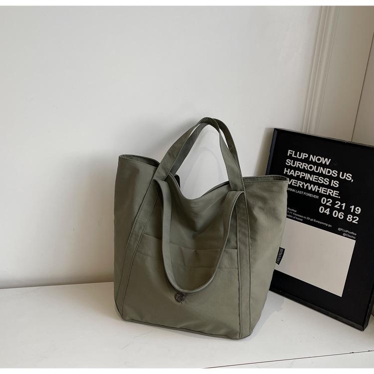 

2025 new nylon tote bag women s bag Korean version of casual large-capacity shoulder handbag commuter bag зелёный