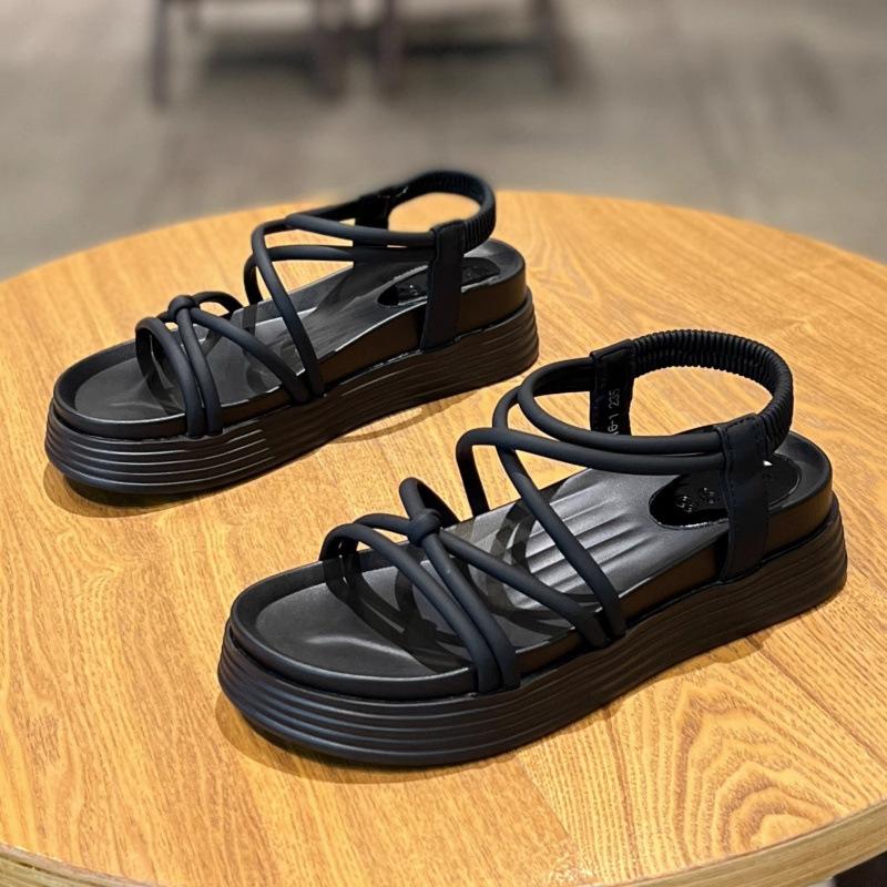 

Roman sandals women 2025 new summer fairy wind wear heightened foot cover seaside beach shoes women thick soles non-slip 35 чёрный