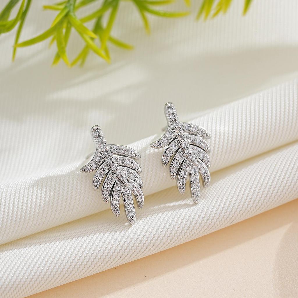 Elegant 18K Gold-Plated Zircon-Inlaid Moon Stud Earrings for Women - Exaggerated C-Shaped Firework Design