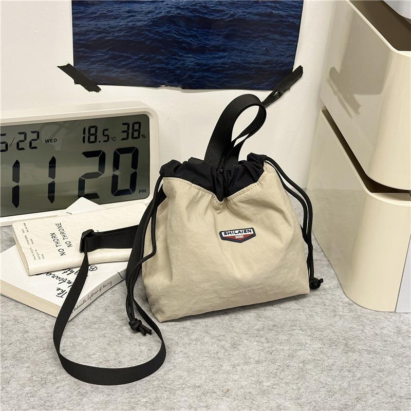 Japanese casual oblique span bag 2025 new Korean version fashionable versatile commuter sports small bag tooling shoulder bucket bag