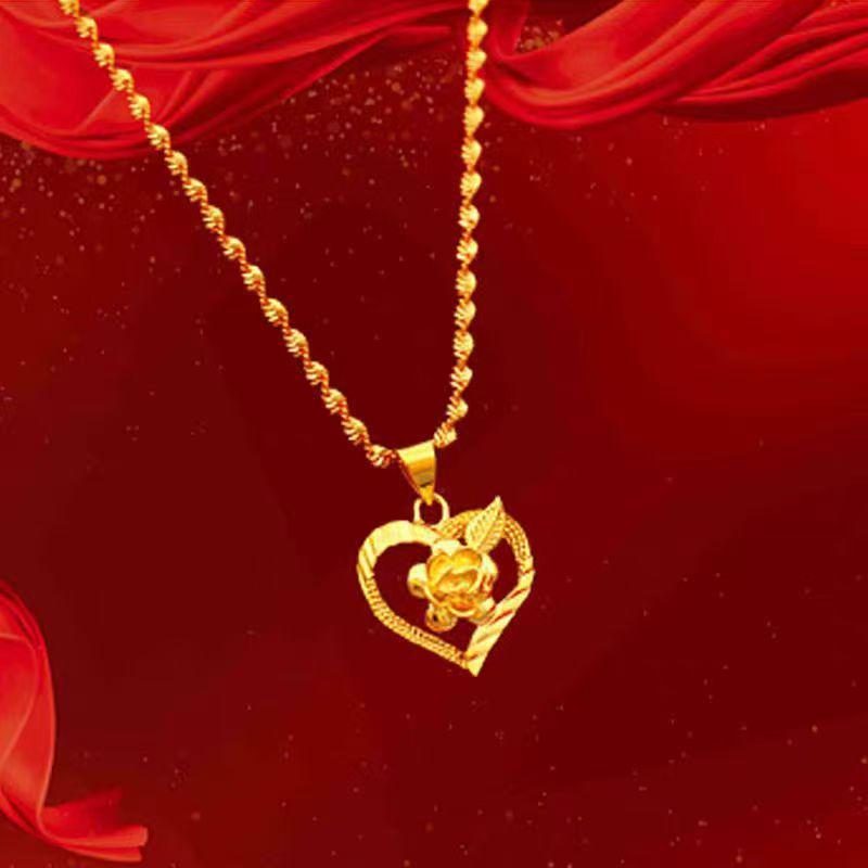 Naszyjnik ze złota piaskowego z wisiorkiem w kształcie serca i róży - Damski dodatek modowy