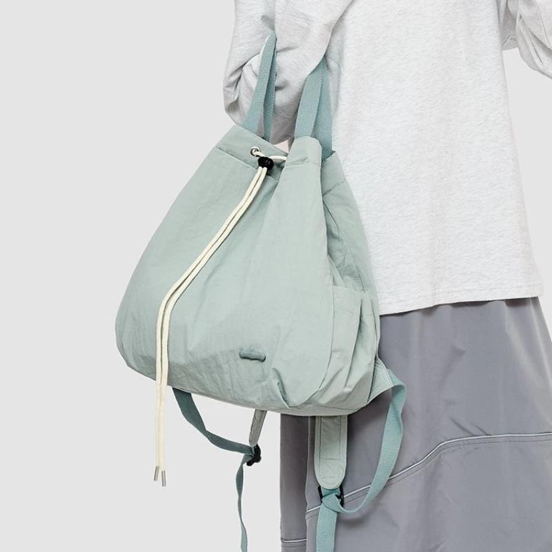 Nuovi Zaini Coulisse Monocolore Morbidi in Nylon 2026 Zaini Casual di Alta Qualità per Donne Filo da Cucito Versatile Borse Scolastiche
