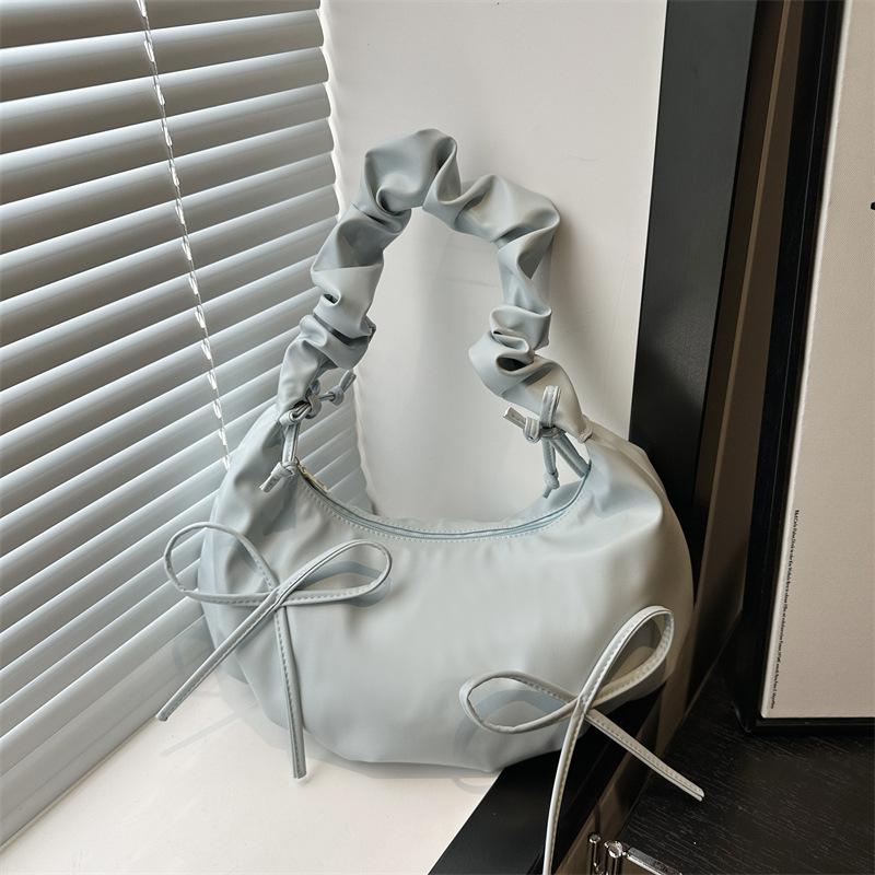 

Однотонная большая вместительная красивая повседневная женская сумка весна и лето новая модная нишевая сумка на одно плечо подмышку для поездок на работу