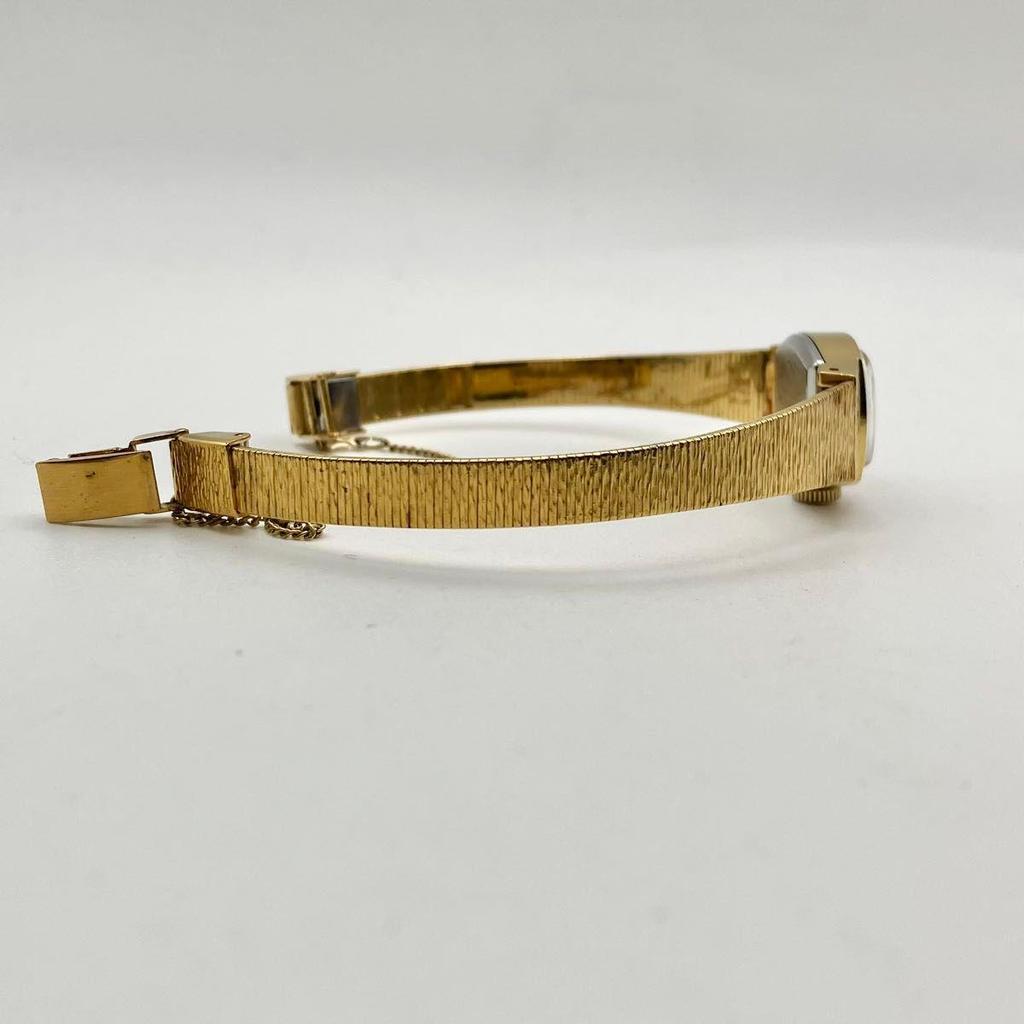 Used In good working condition Seiko ladies manual winding wristwatch gold green dial