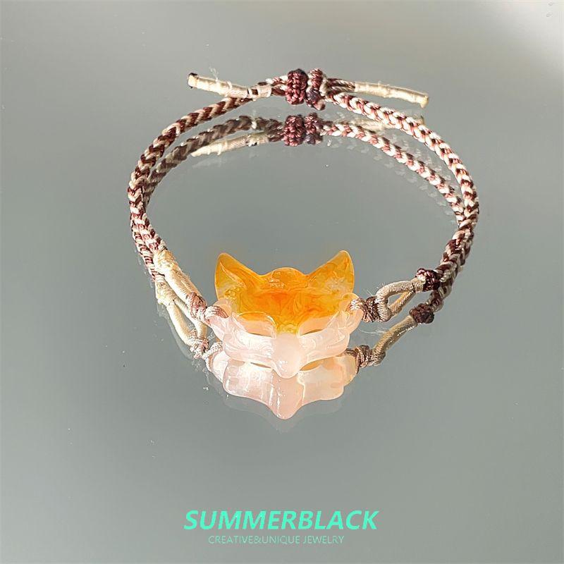 

Новый китайский стиль Нефритовый браслет с плетеной веревкой и подвеской в виде лисы для лица Женский 2025 Новое поступление Мода для меньшинств Стильный Легче всего сочетать Ремешок для ношения Drawstring Fox Bracelet