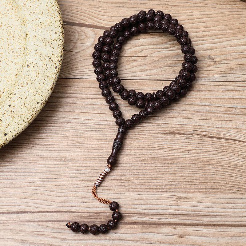 Ručně vyráběný 99-korálkový růženec Tasbih s imitací dřevěné kresby ze Saúdské Arábie