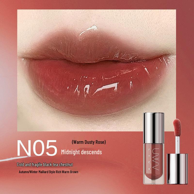 

AJAJ Encounter Series Lip Essence: Honey-infused care for lips, diminishes lines, with a water-light gloss finish. 5ml