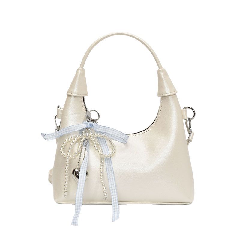 Foreign style bow hand bag women's 2025 new Korean version ins messenger bag fashionable commuter shoulder bag