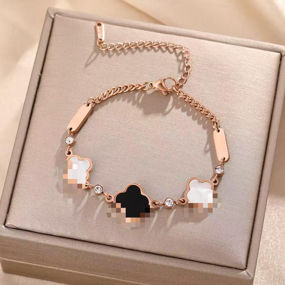 Luxe Titanium Staal Vierbladig Klaver Armband in Koreaanse Stijl met Ingelegde Diamanten voor Vrouwen - Kleurvast