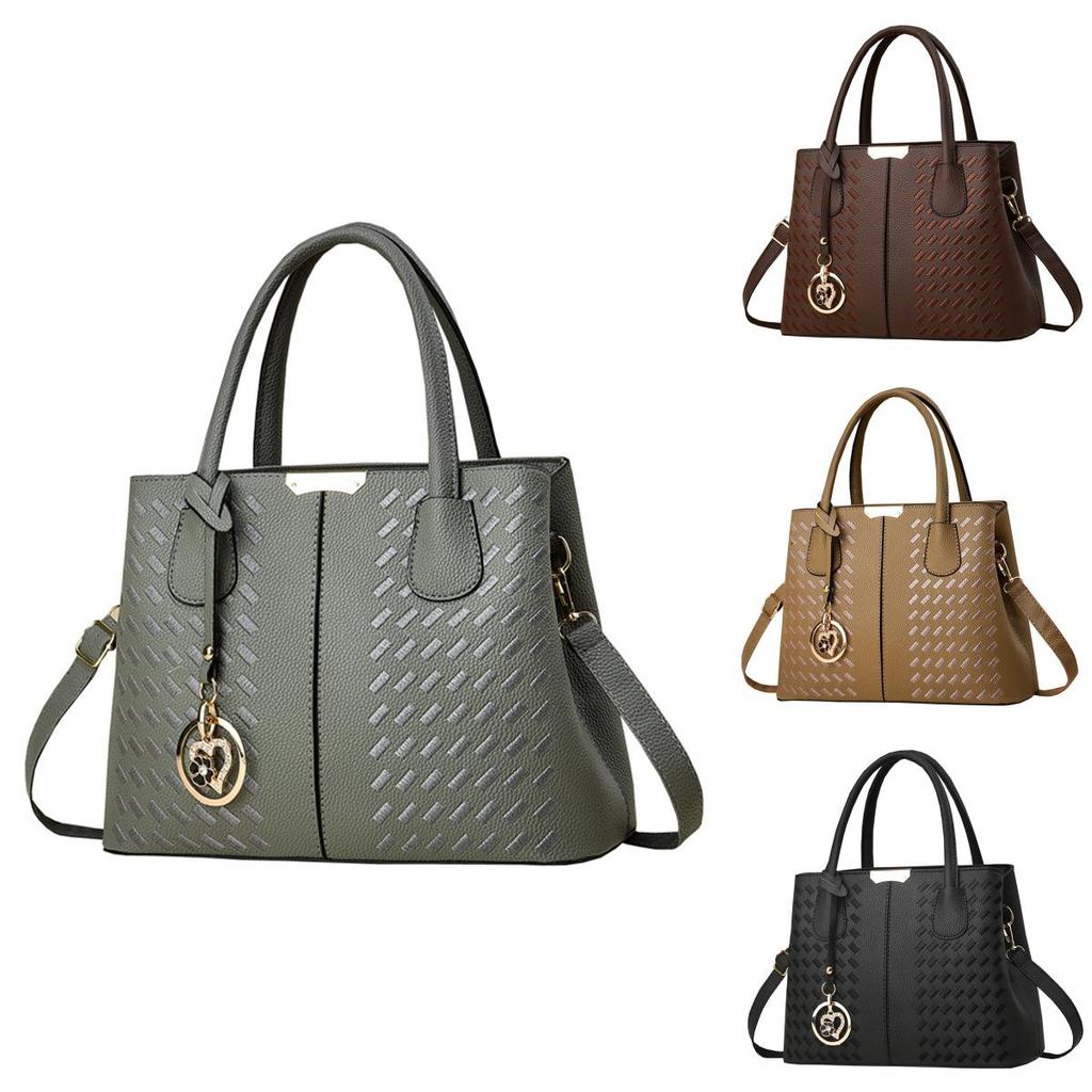 Stilvolle grenzüberschreitende Tragetasche mit gestickten Details für Mütter mittleren Alters