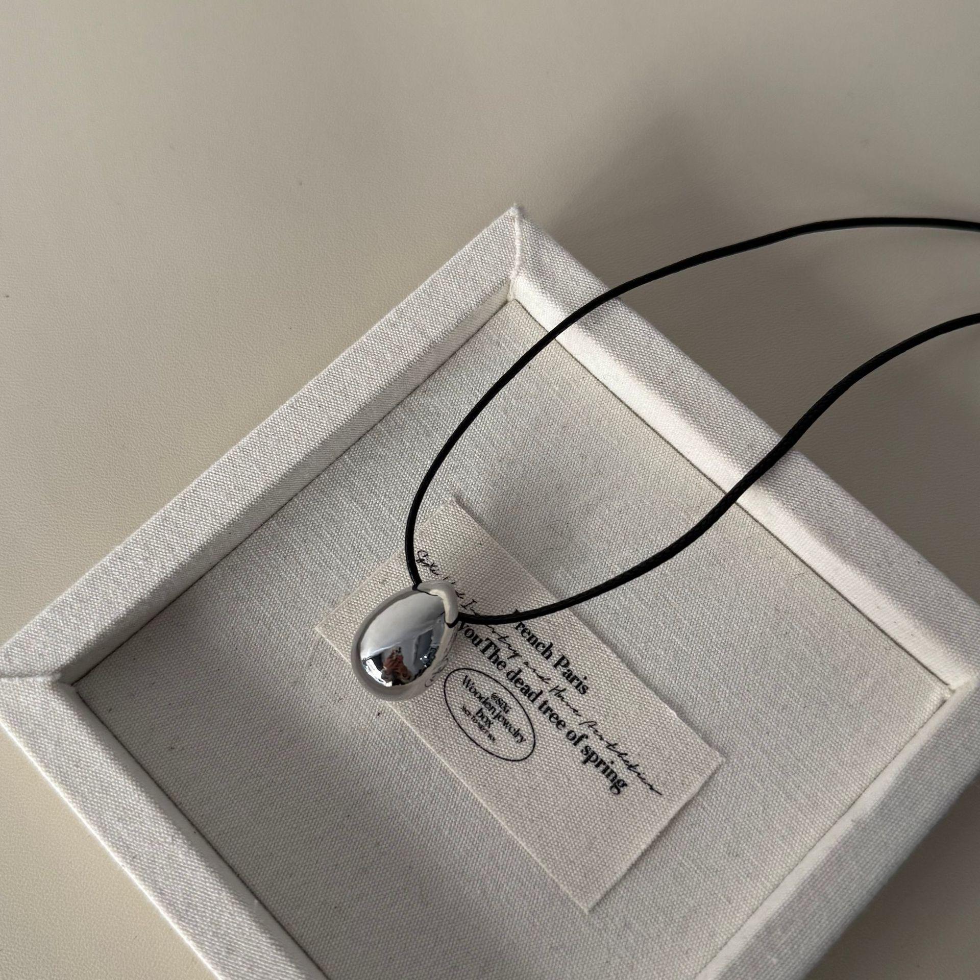 

Минималистичное черное титановое стальное ожерелье с подвеской в виде капли воды для женщин