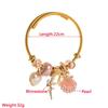 Adjustable Gold Alloy Bracelet with Pearl & Seashell Charms