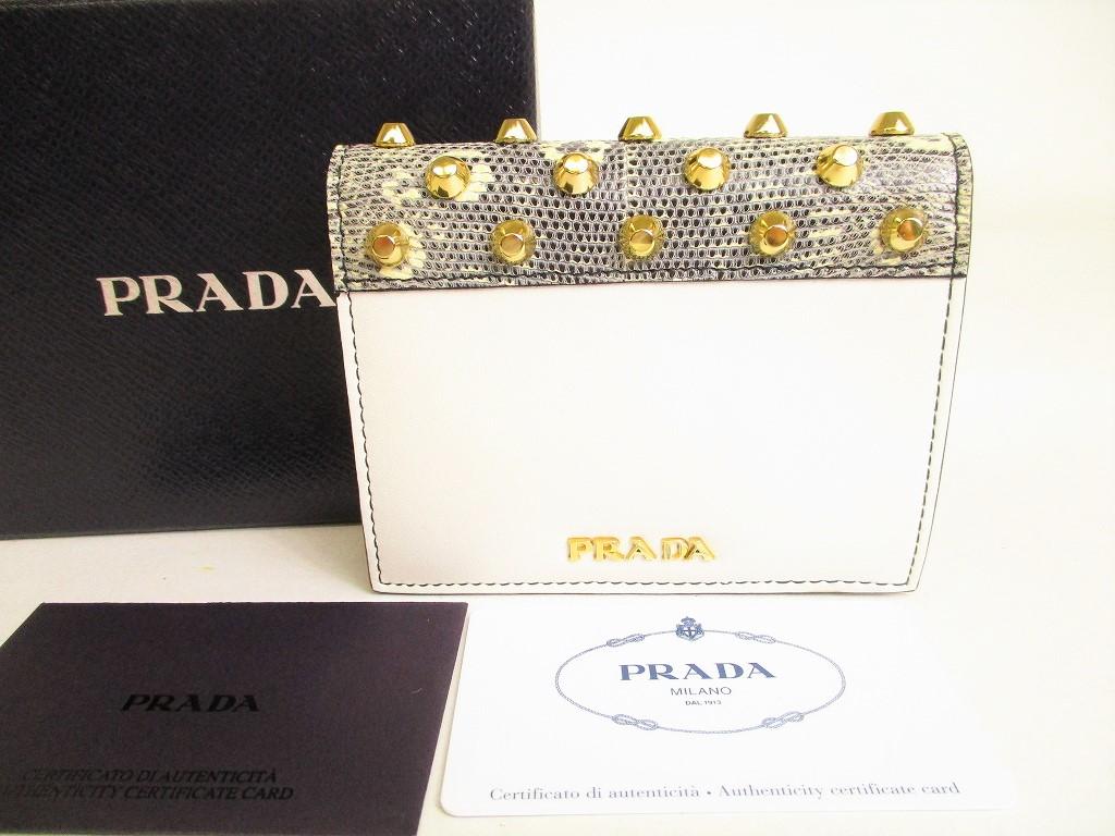

Автентичний гаманець PRADA White City із телячої шкіри H/W Compact Wallet #9190 Refurbished