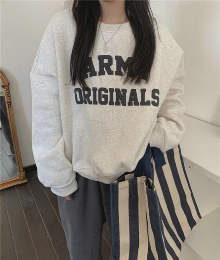 Dámský vintage svetr s kulatým výstřihem, dlouhým rukávem a volným úpletem