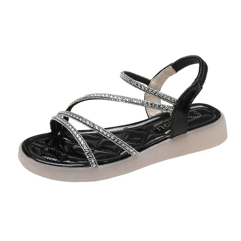 

Модные сандалии на плоской подошве Женские сандалии со стразами Удобные сандалии для женщин Лето Новинка 2025 Без каблука Элегантная римская мода 40 чёрный