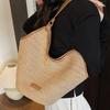 Large capacity beach woven bag women's 2025 new spring and summer niche design single shoulder commuter straw woven tote bag