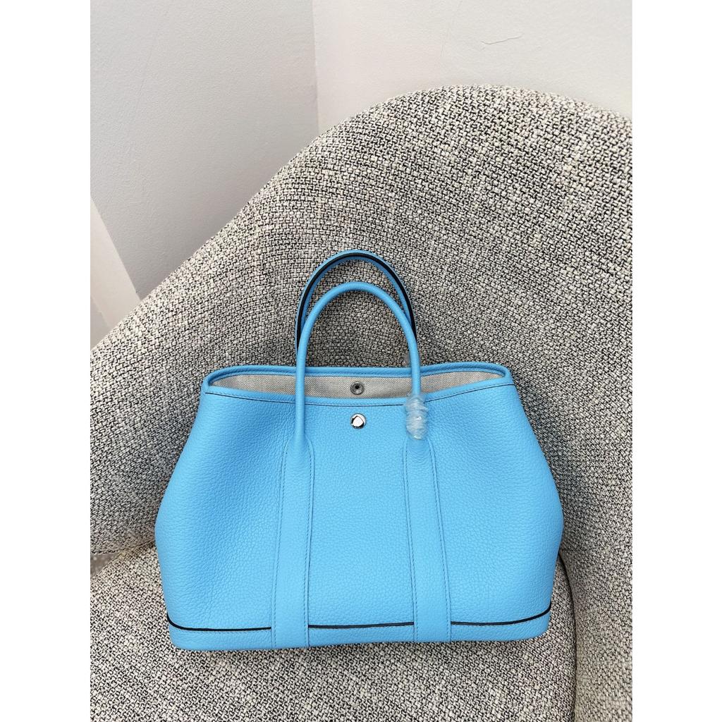 Borsa da giardino cucita a mano con filo cerato, ferramenta interamente in acciaio, borsa da donna portatile in pelle bovina primo strato con motivo a collo di mucca Ntogo