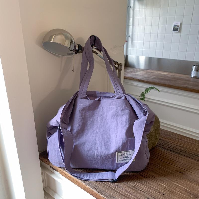 Canvas bag crossbody female Korean version fashionable simple large capacity student class lightweight simple solid color portable shopping bag