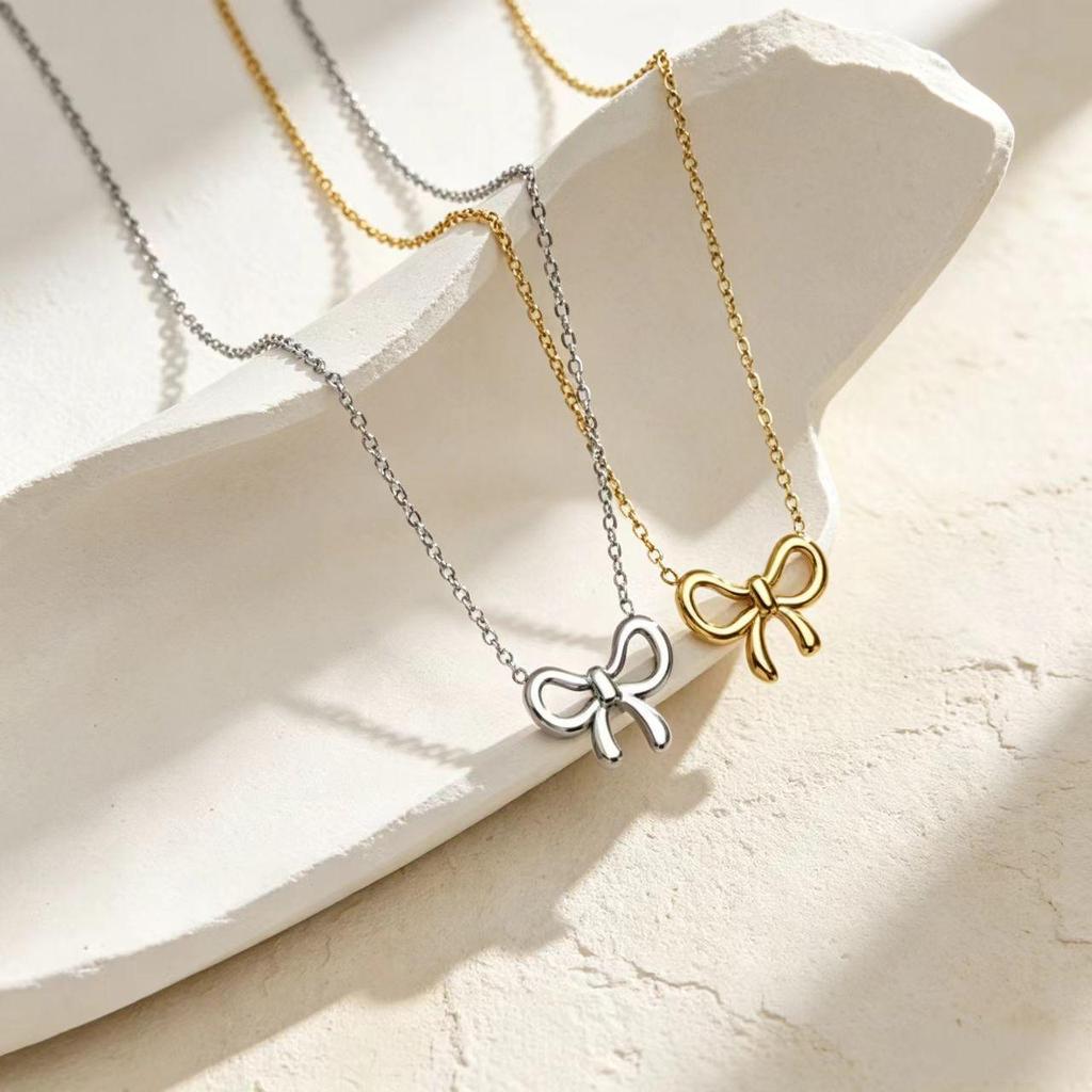 Elegant Double Happiness Knot Bow Pendant Necklace for Women - Versatile High-End Fashion Jewelry