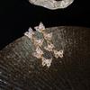 Silver needle zircon butterfly fringed earrings, niche creative design earrings, fashionable light luxury ins style earrings