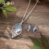 Luxury new color painting oil hollow leaf stud earrings pendant set, women's simple versatile leaf necklace