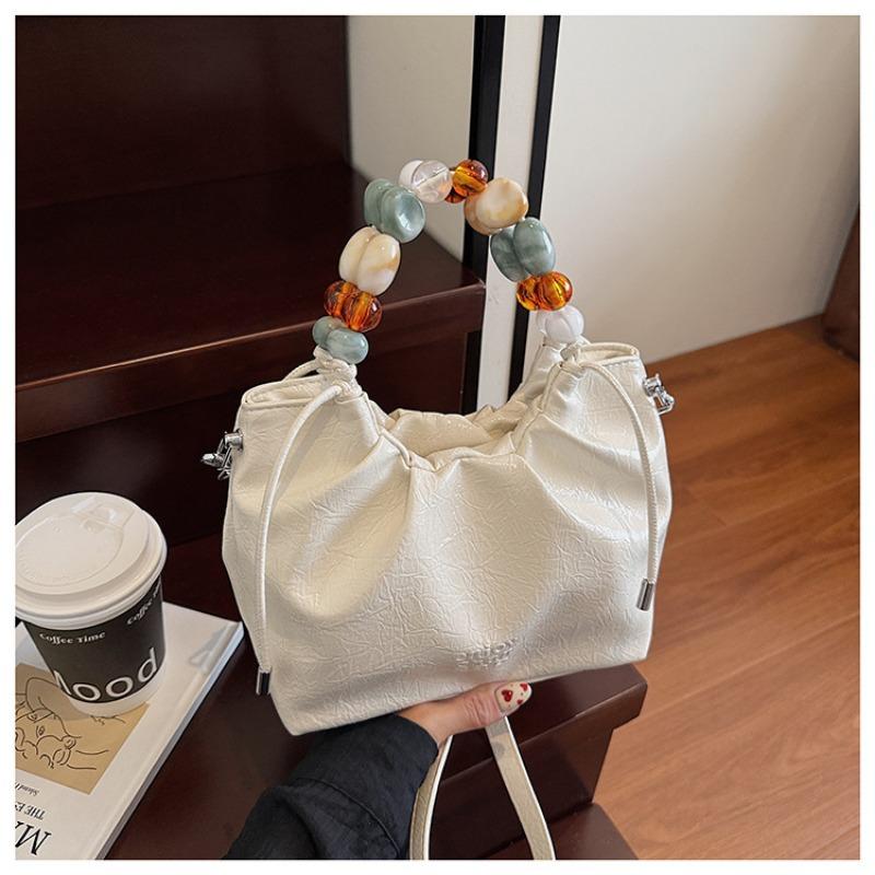 Pleated high-end fashion versatile new bucket bag women's solid color cute niche design messenger bag