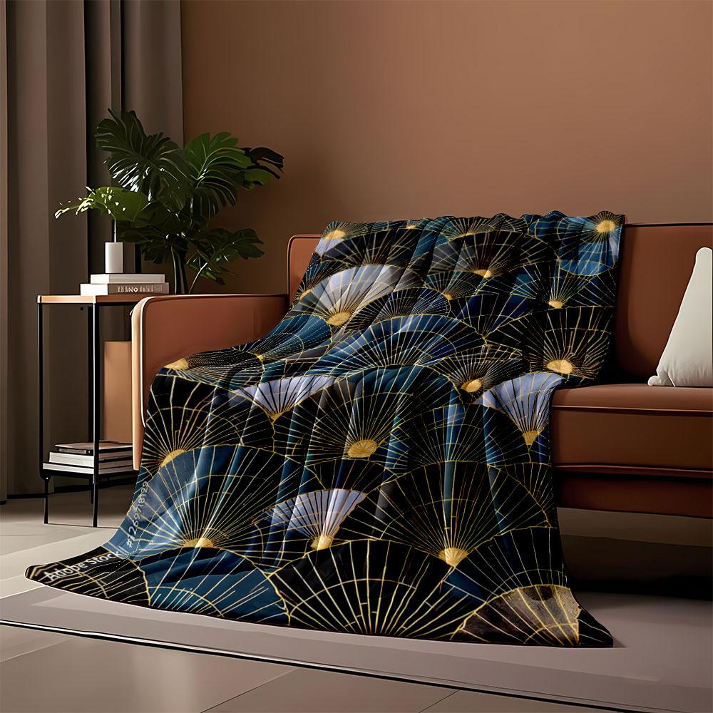 Overlapping fan shapes with gold lines and gradients of blue and black. for all seasons blanket lunch break throw gift