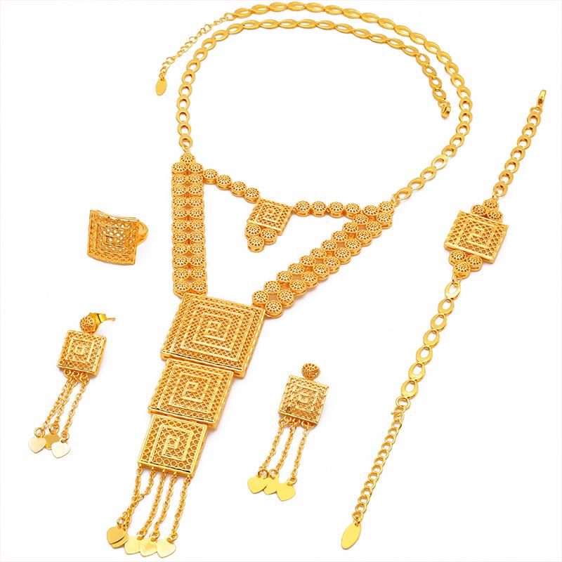 Dubai Wedding Jewelry Set: Ethnic Brass Gold-Plated Necklace, Earrings, Ring, and Bracelet.