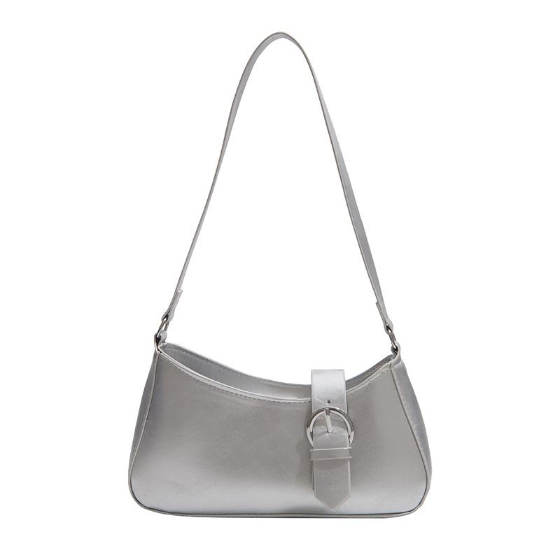 

Fashion portable underarm bag texture retro niche design bag women s spring new trendy solid color crescent bag срібний