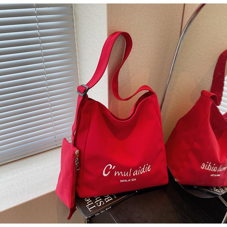 

Korean large-capacity canvas bag 2025 new fashion letter versatile shoulder tote bag casual and lightweight messenger bag бордовый