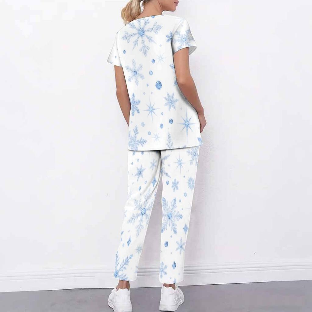 Women Plus Size White Floral Printed Scrub Set Cutout Neck Short Sleeve Pocket Top Long Pants