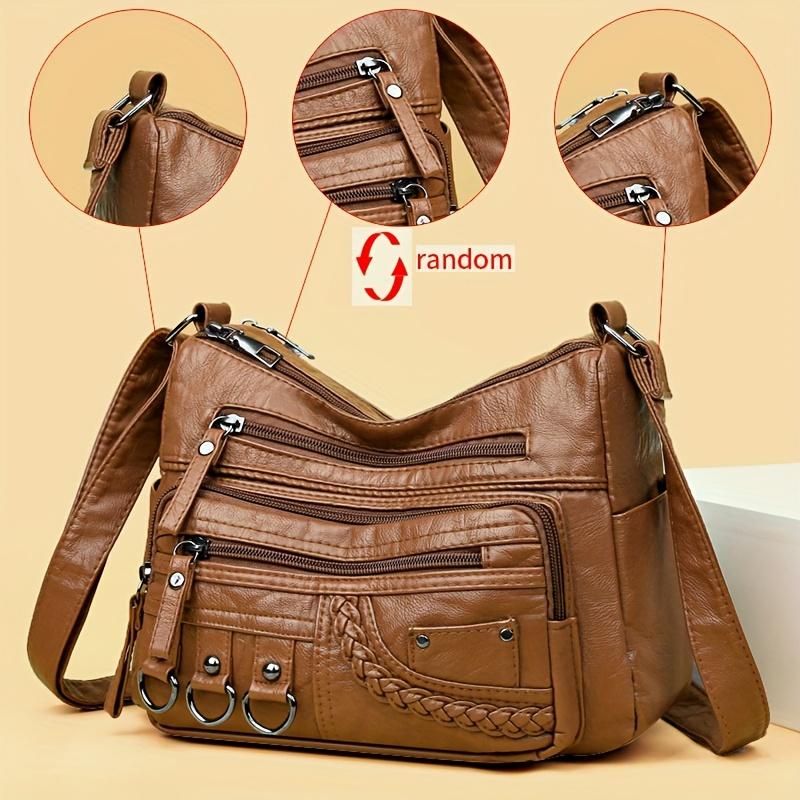 

Женская сумка через плечо из мягкой кожи большой емкости, повседневная сумка через плечо со случайными цветочными украшениями, множеством карманов и плетеными акцентами коричневый