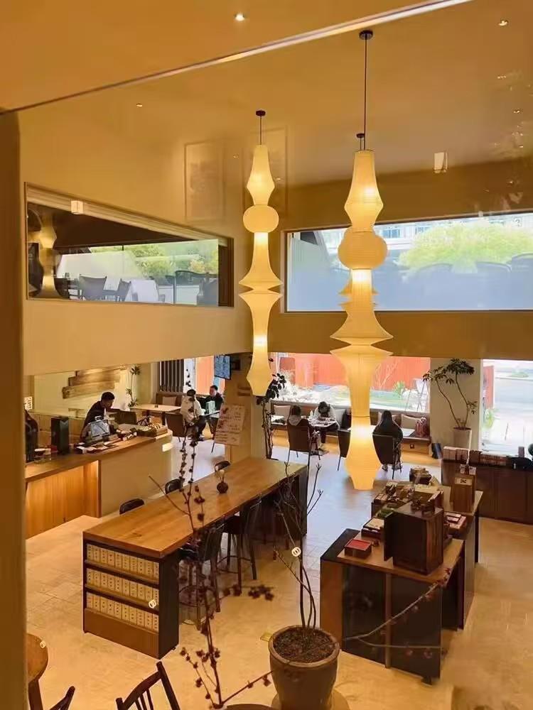 Japanese Wabi-sabi Style Isamu Noguchi Xuan Paper Long Vintage Chandelier for Aisles, Staircases, and Loft Window Displays.