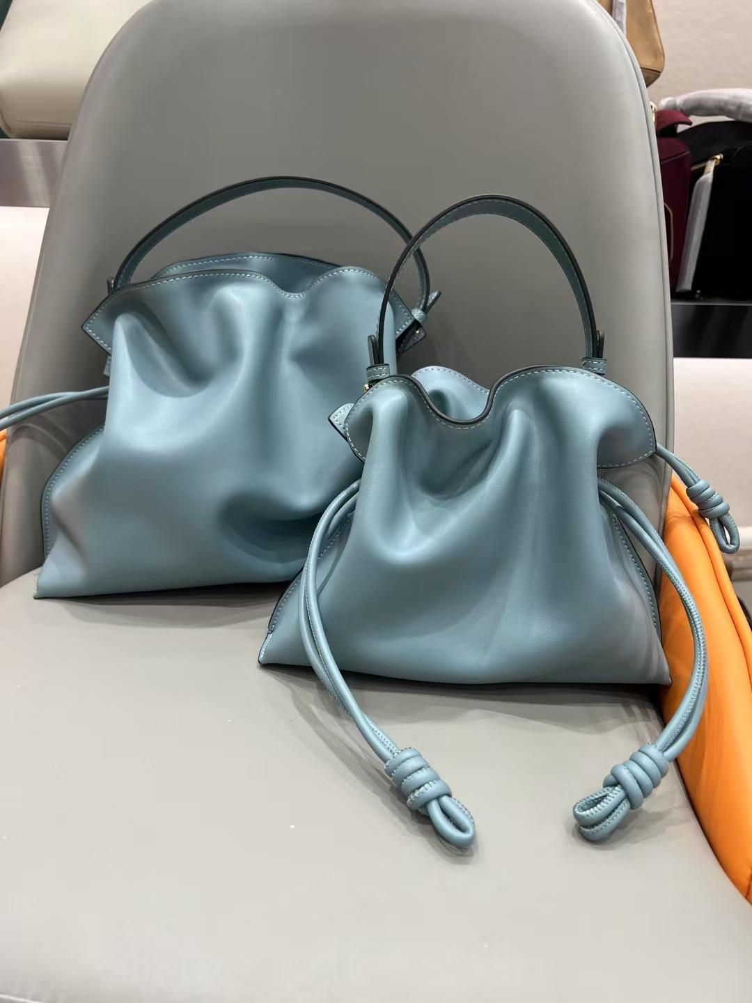 

2024 Luojia Мягкая сумка-ведро из коровьей кожи: Универсальная большая и маленькая сумка, сумка через плечо и сумка-мессенджер для женщин Large, With Text, 30cm x 24cm x 9cm