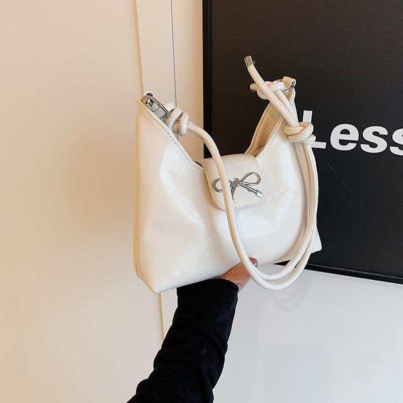 

2024 New Summer Simple Fashion Shoulder Bag Simple Fashion Crossbody Bag Women s Simple Fashion Crescent Bag Women s білий