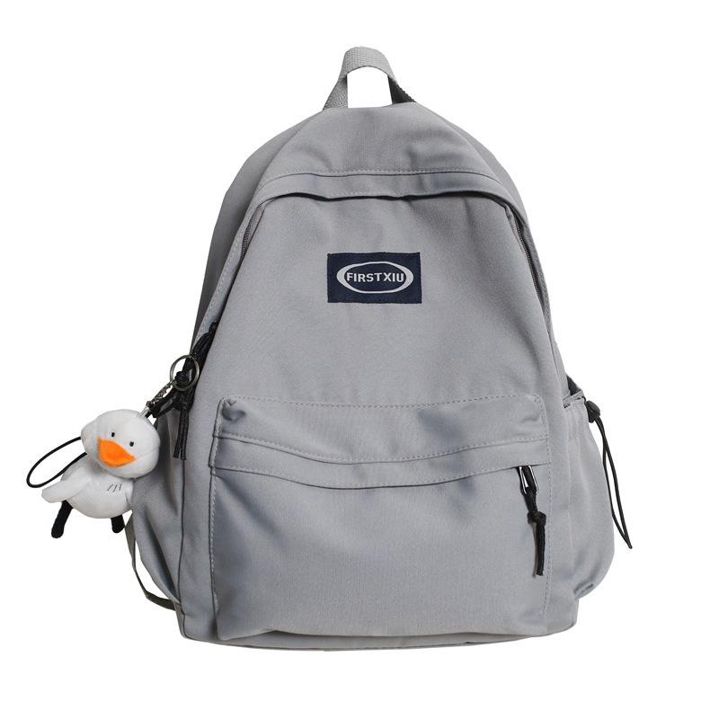 

College student schoolbag female Korean version Harajufeng high school student solid color Mori backpack simple large-capacity backpack male No pendant