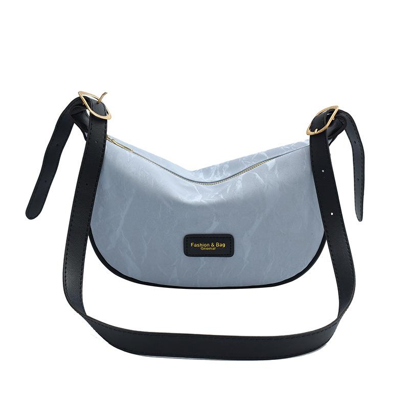 

Texture contrasting color splicing women s bag 2024 new foreign style casual ins messenger bag fashionable one shoulder dumpling bag синій