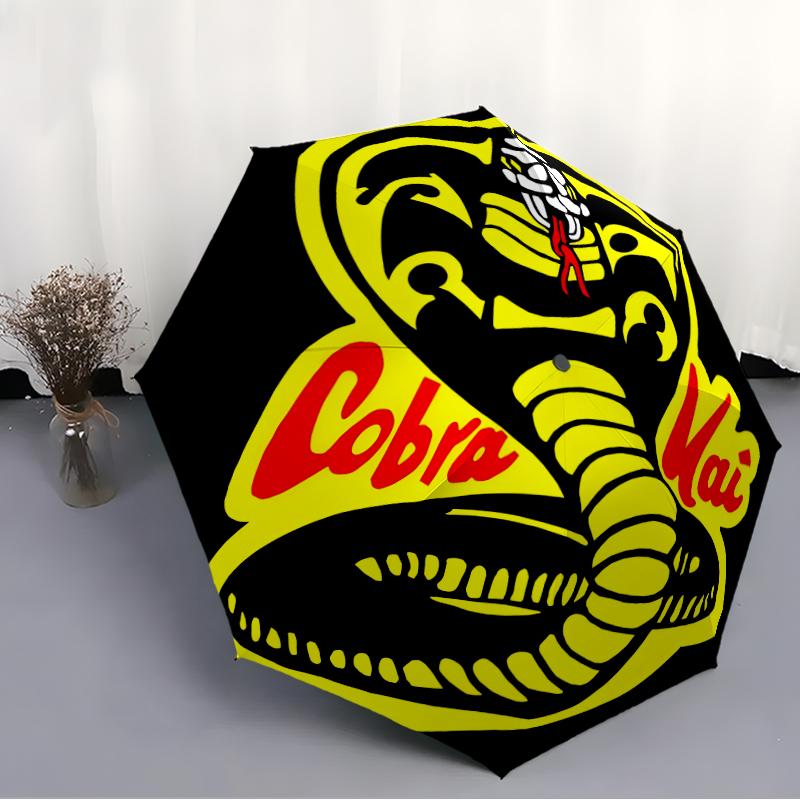 Cobra Kai Fashionable Automatic Opening/Closing Folding Umbrella. Portable and Foldable, Ideal for Gift, Travel, and Daily Use.