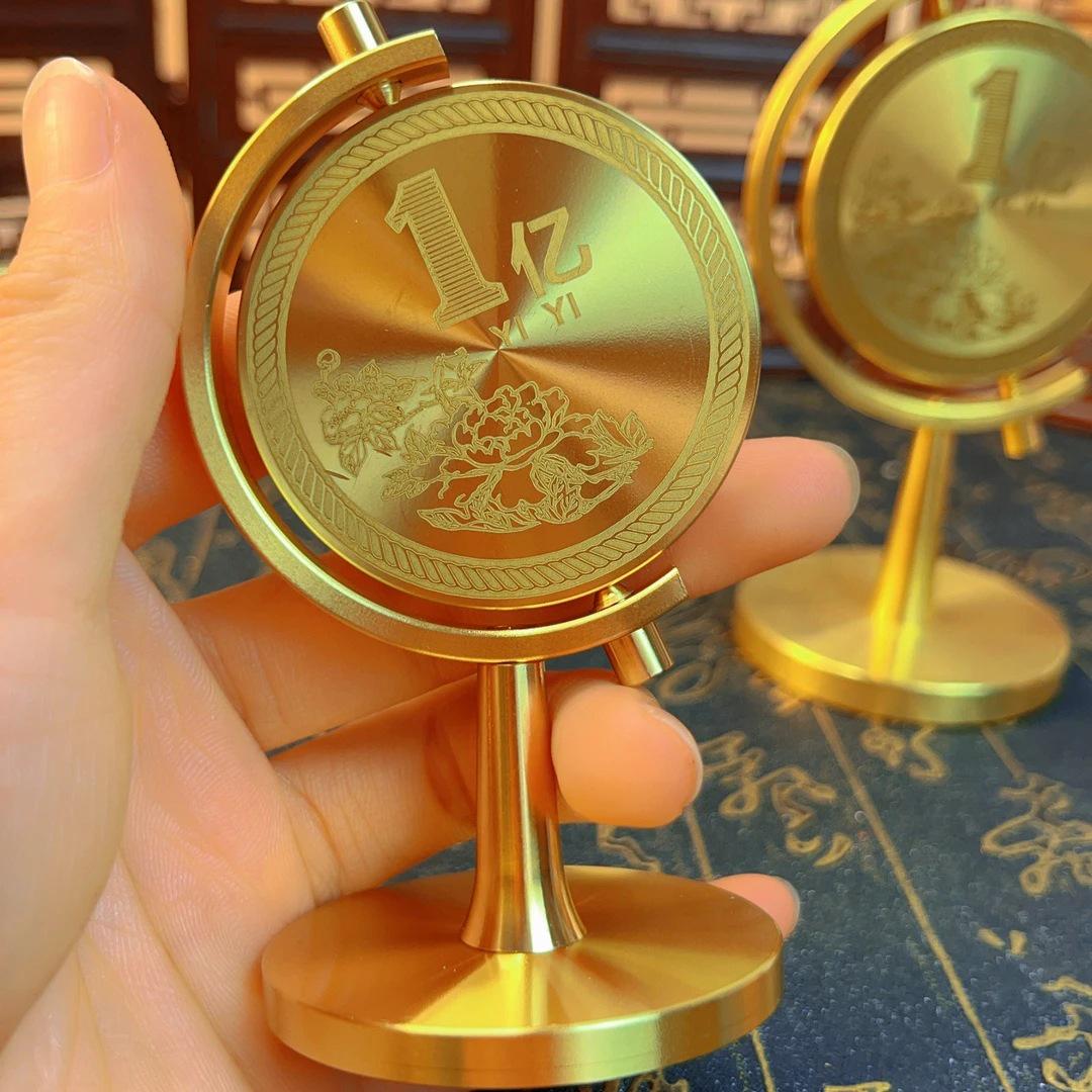 

Elite Brass Rotating Ornament: Luxurious Living Room & Office Decor Small Rotating Ornament - 1 Piece