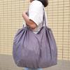 Eco-Friendly Foldable Shopping Tote with Buckle, Drawstring Closure, and Single Shoulder Strap