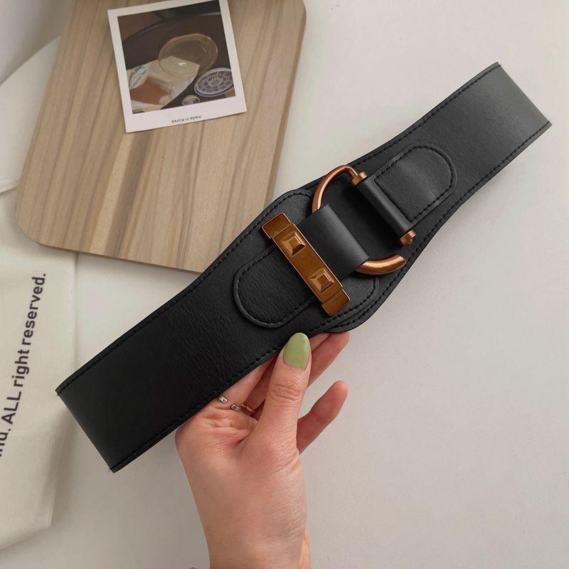Elastic Womens Contemporary Waist Belt Sleek Design Available In Classic Black And Brown