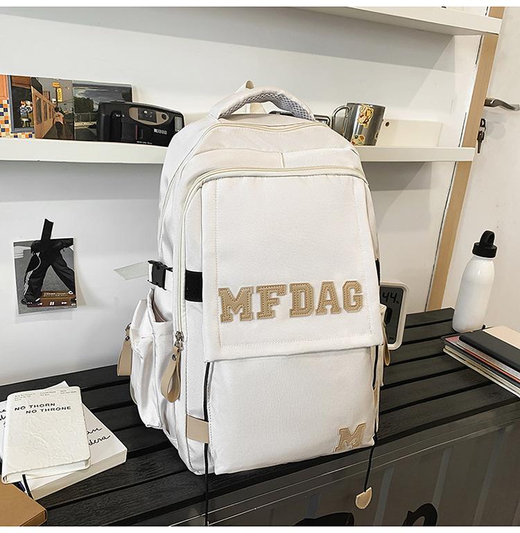 Schoolbag 2025 New Large Capacity Versatile Solid Color Letter Multi-compartment Junior High School Student Schoolbag High Value Lightweight Backpack