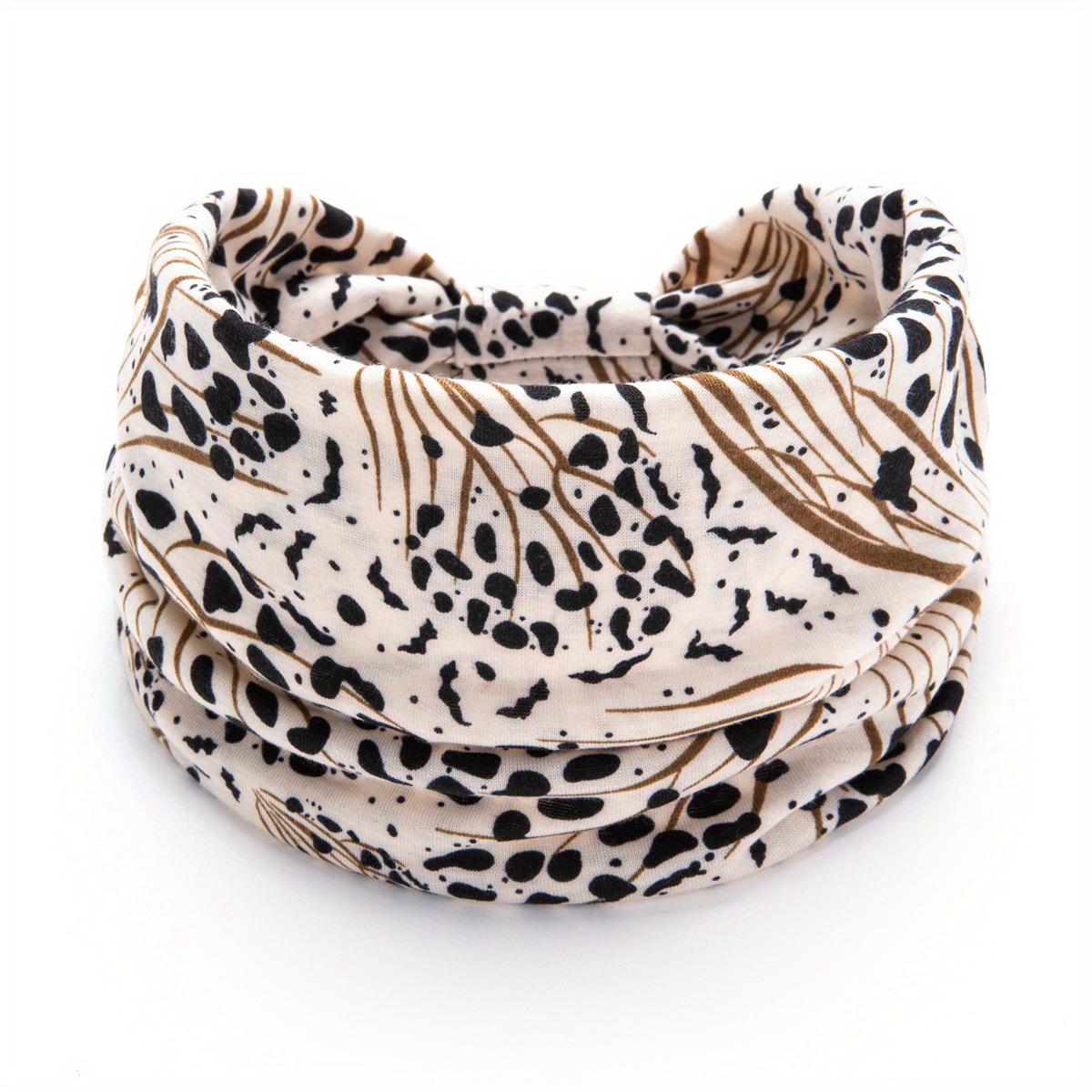 

Autumn/Winter Leopard Print Knotted Headband: Trendy Elastic Sweat-Absorbing Accessory for Active Wear