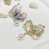 Light Luxury Rhinestone Butterfly Pearl Brooch – Hollow Design with Insect Button