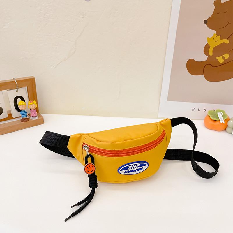 Stylish Kids Sling Bag For Boys And Girls Cool Letter Design Fashionable Crossbody Accessory In Nylon With Durable Features And Fun Colors