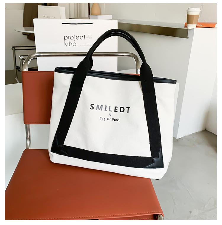 

2026 Spring Women s Canvas Tote Bag Spacious Minimalist Letter Print Crossbody Shoulder Purse Women s bag large capacity 42x33x11cm білий