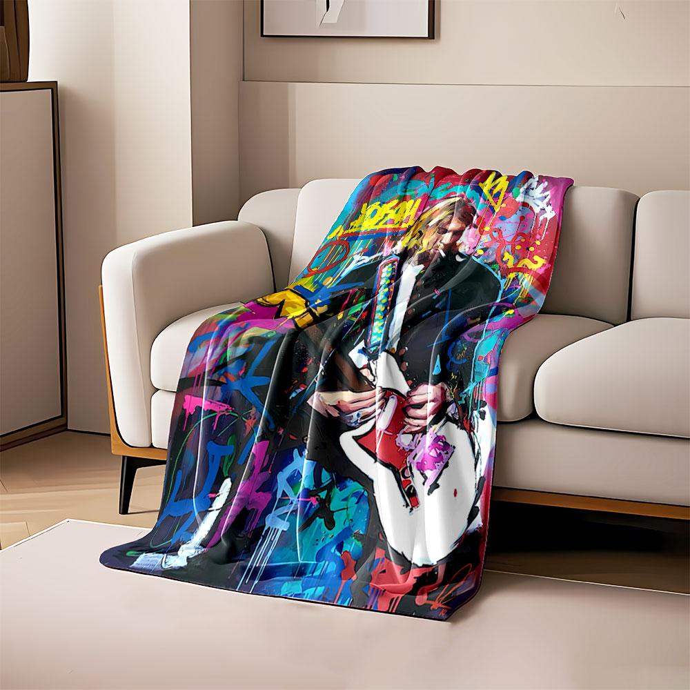 

A bold, vibrant graffiti-style portrait with chaotic shapes and splashes. for all seasons blanket lunch break throw gift 80cm x 120cm